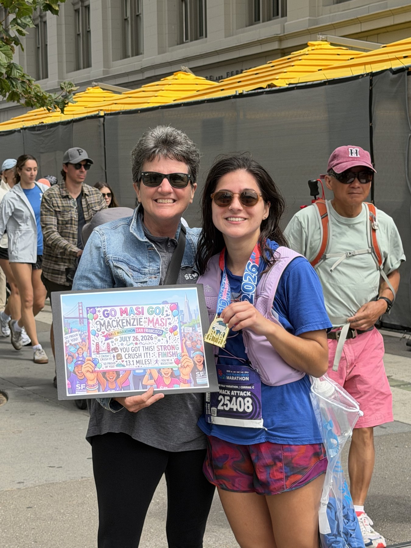 With my mom and the finisher medal